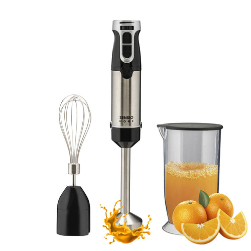 A black Sensio Home hand blender with attachments, displayed alongside a glass of orange juice and some oranges, suggesting its use for making beverages - 1000W Super Powerful Hand Blender